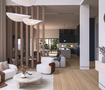 Spacious modern living room with elegant furniture and natural lighting.